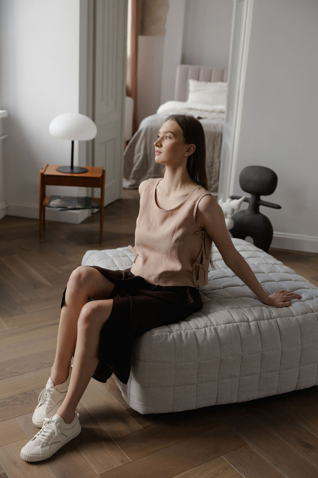 Sleeveless linen top with side tie details in peach linen