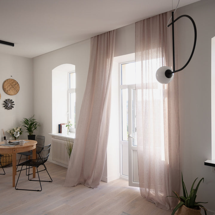 Let your windows breathe with sheer linen curtains!