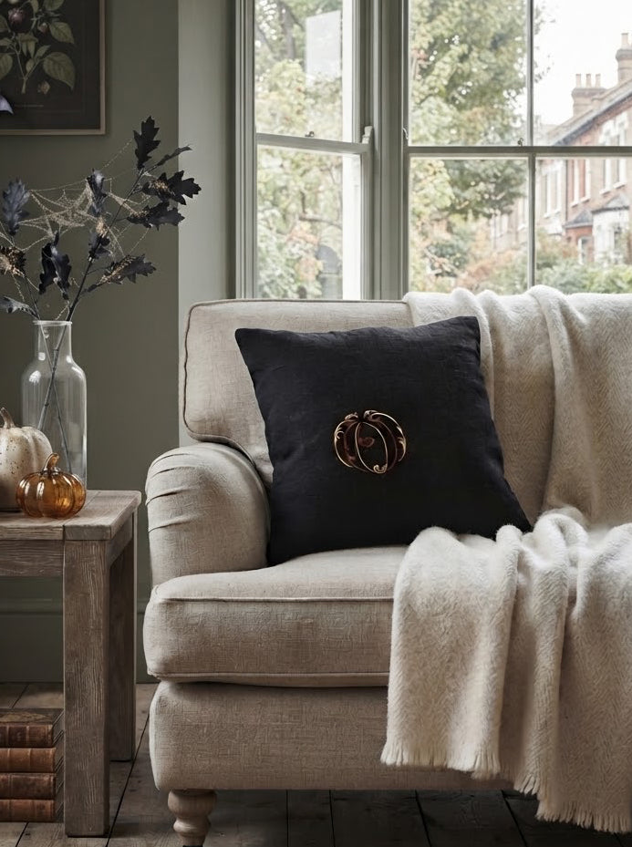 black linen halloween pillow with pumpkin