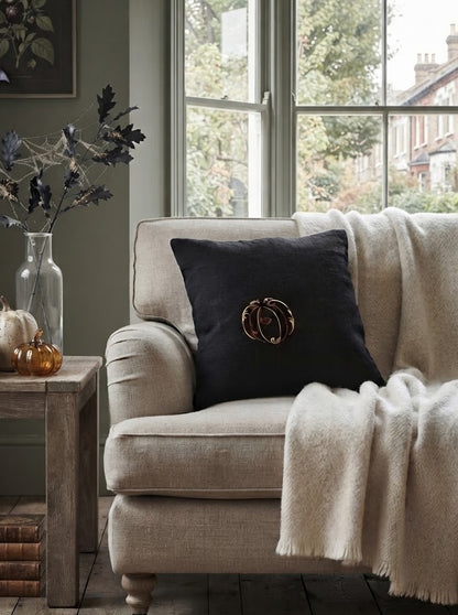 black linen halloween pillow with pumpkin
