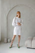 white linen dress with puff sleeves