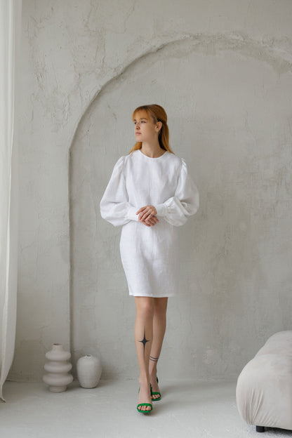 white linen dress with puff sleeves