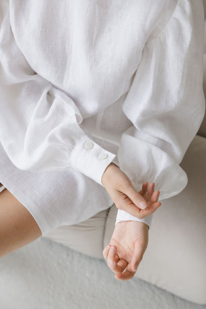 white linen dress with puff sleeves