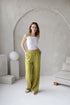 green linen pants with crease