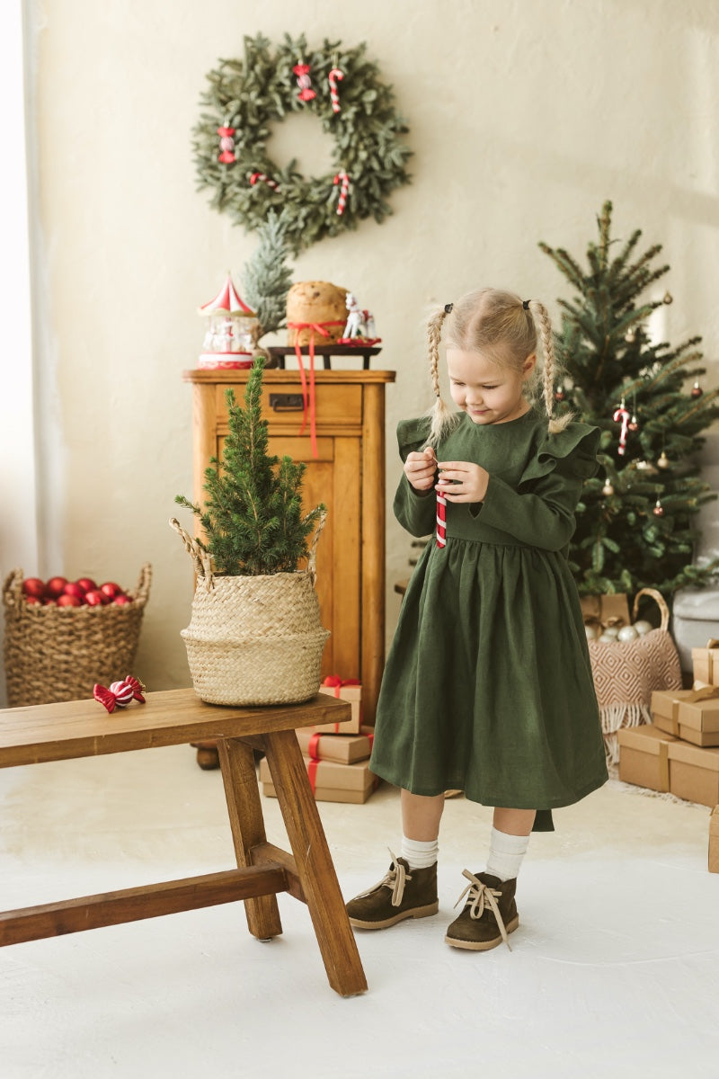 Dark green linen girls dress with ruffles