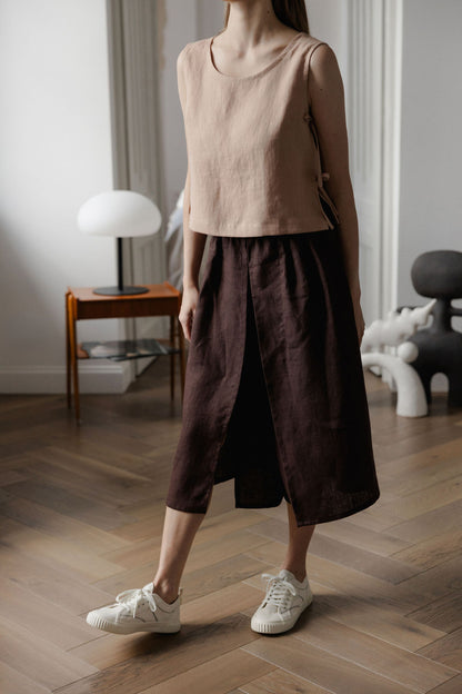 Sleeveless linen top with side tie details in peach linen