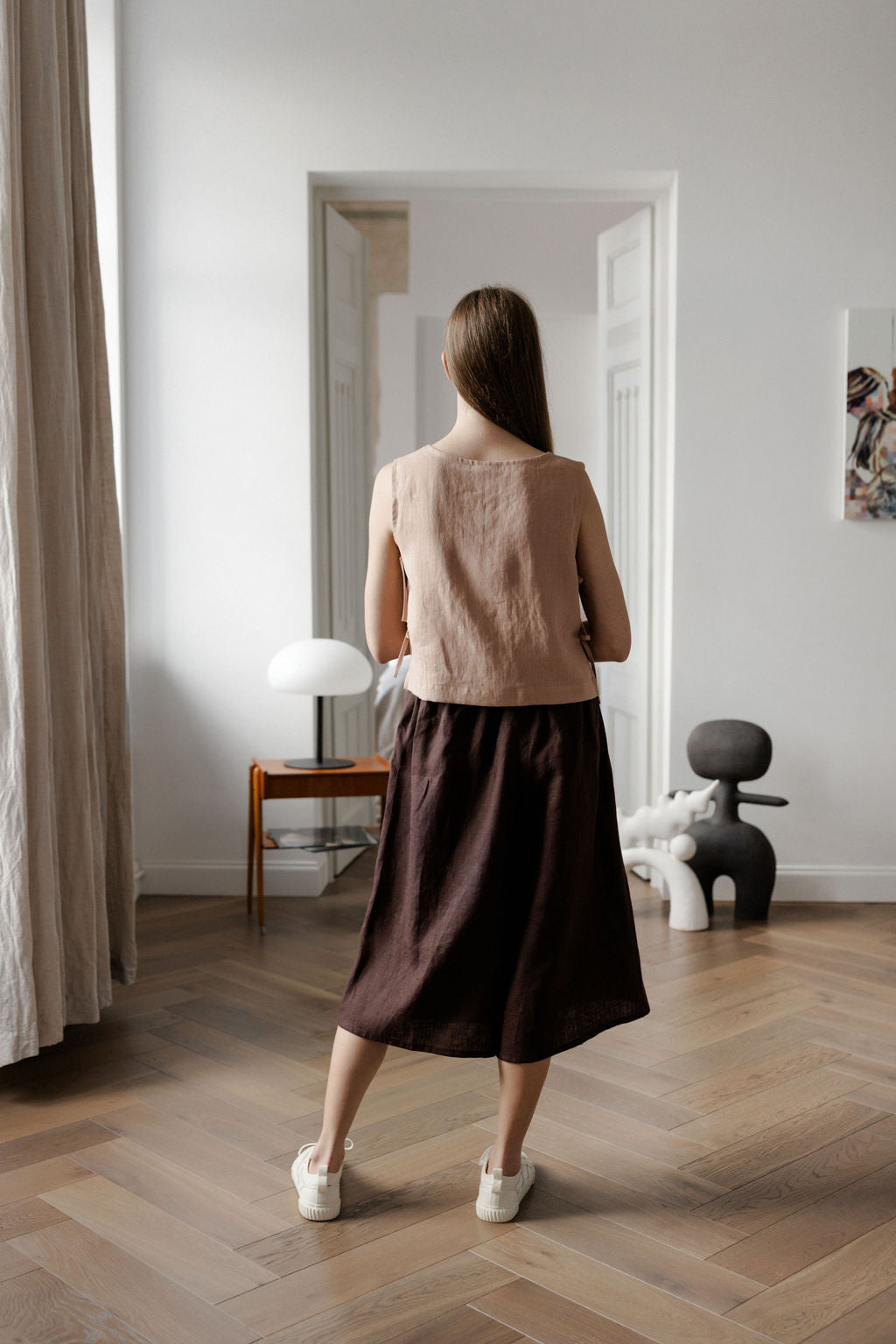 Sleeveless linen top with side tie details in peach linen