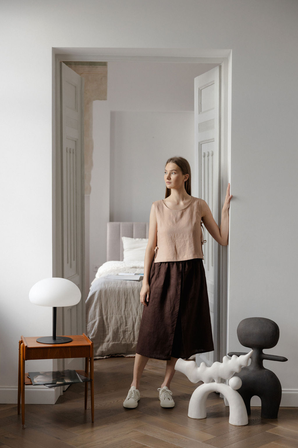 Sleeveless linen top with side tie details in peach linen
