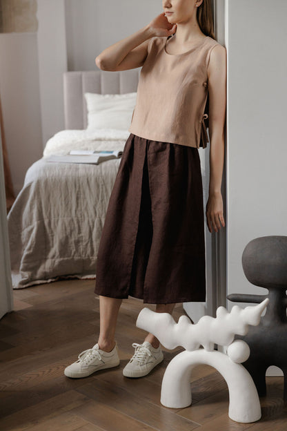 Sleeveless linen top with side tie details in peach linen