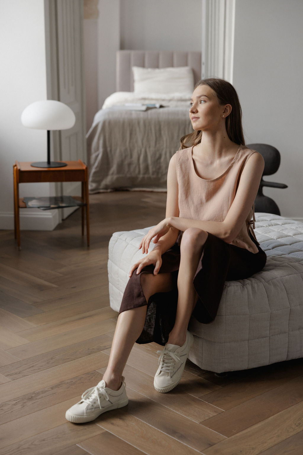 Sleeveless linen top with side tie details in peach linen