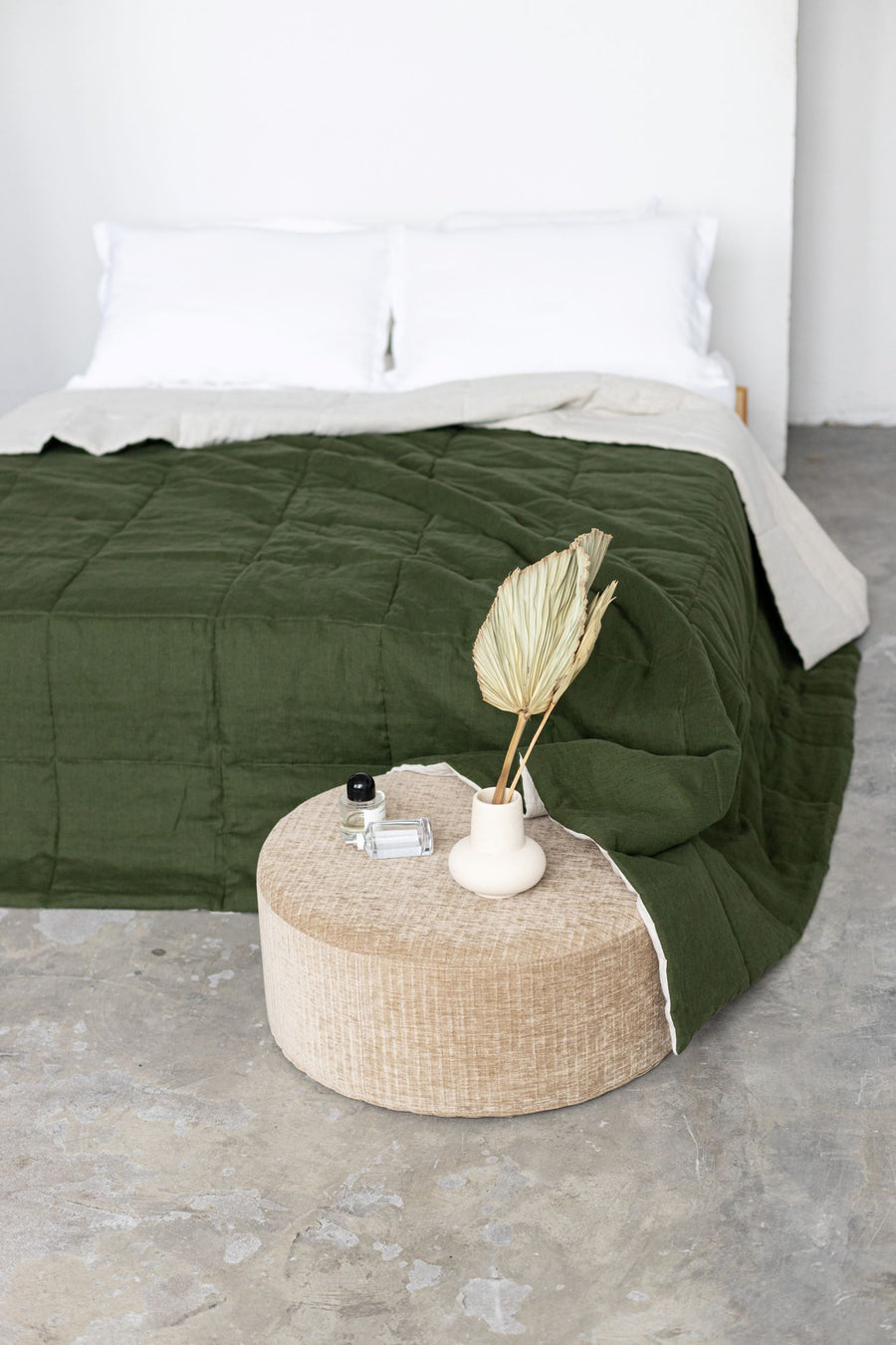 Dark green quilted linen bedspread