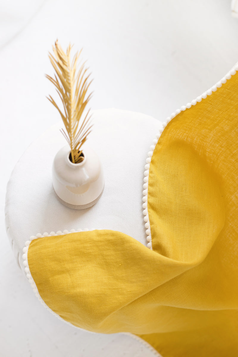 linen curtain with pom pom trim