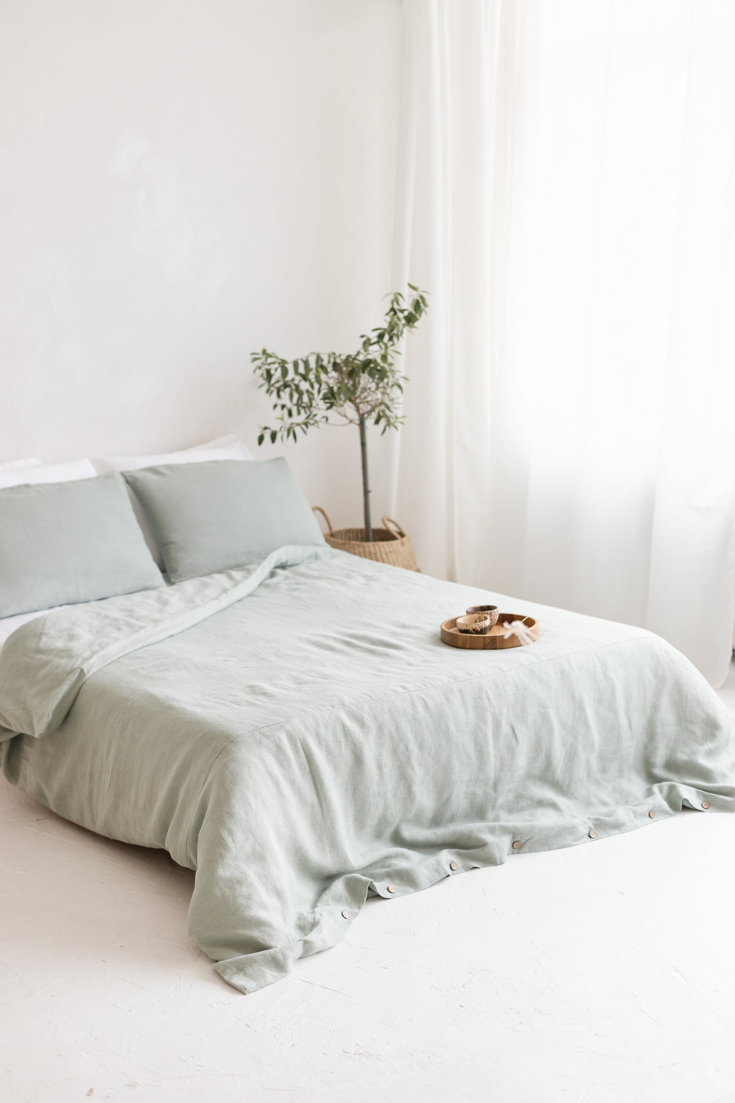 Sage linen bedding set with buttons