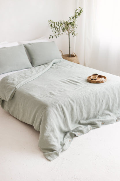 Sage linen bedding set with buttons