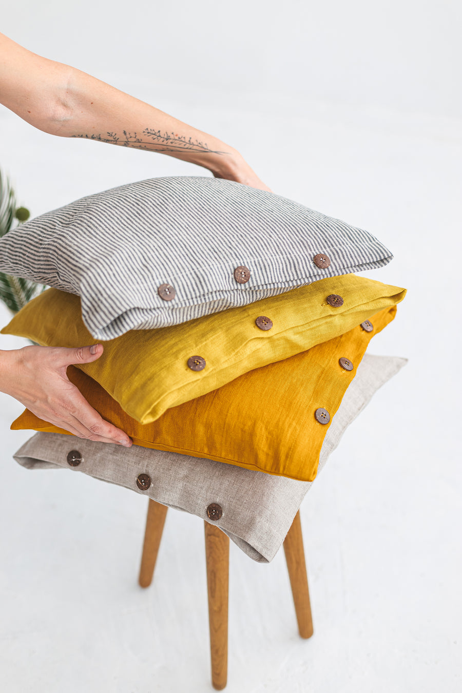 yellow linen pillow cover with buttons